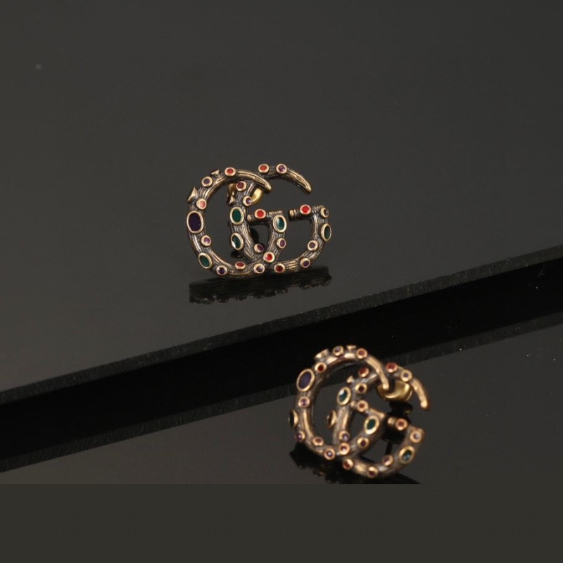 G*u*i earrings